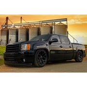 OE Wheels CV98 22x9 6x139.7 Gloss Black Wheels 285-45-22 Bridgestone Dueler Alenza HL Tires TPMS SET